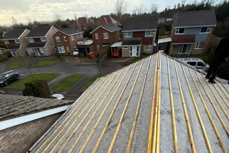 New breathable membrane and battens on a roof in Hertford, houses below