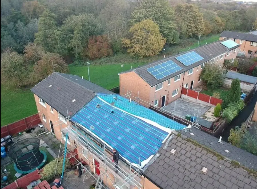 St Albans terraced house re-roof from above: old roof stripped and new felt laid, scaffold up